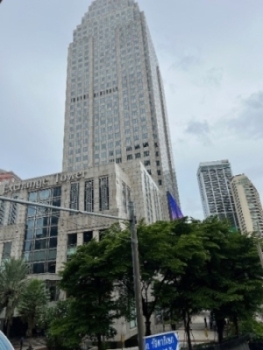 Photo of the exterior of Exchange Tower, where the PMDA Asia Office is located