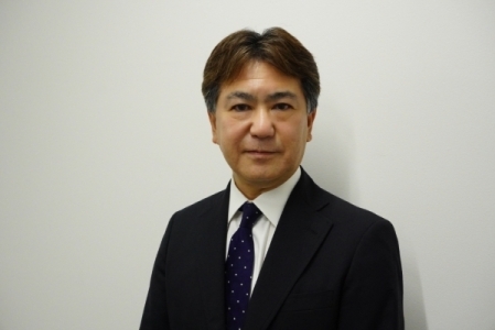 Photo of head of PMDA Asia Office